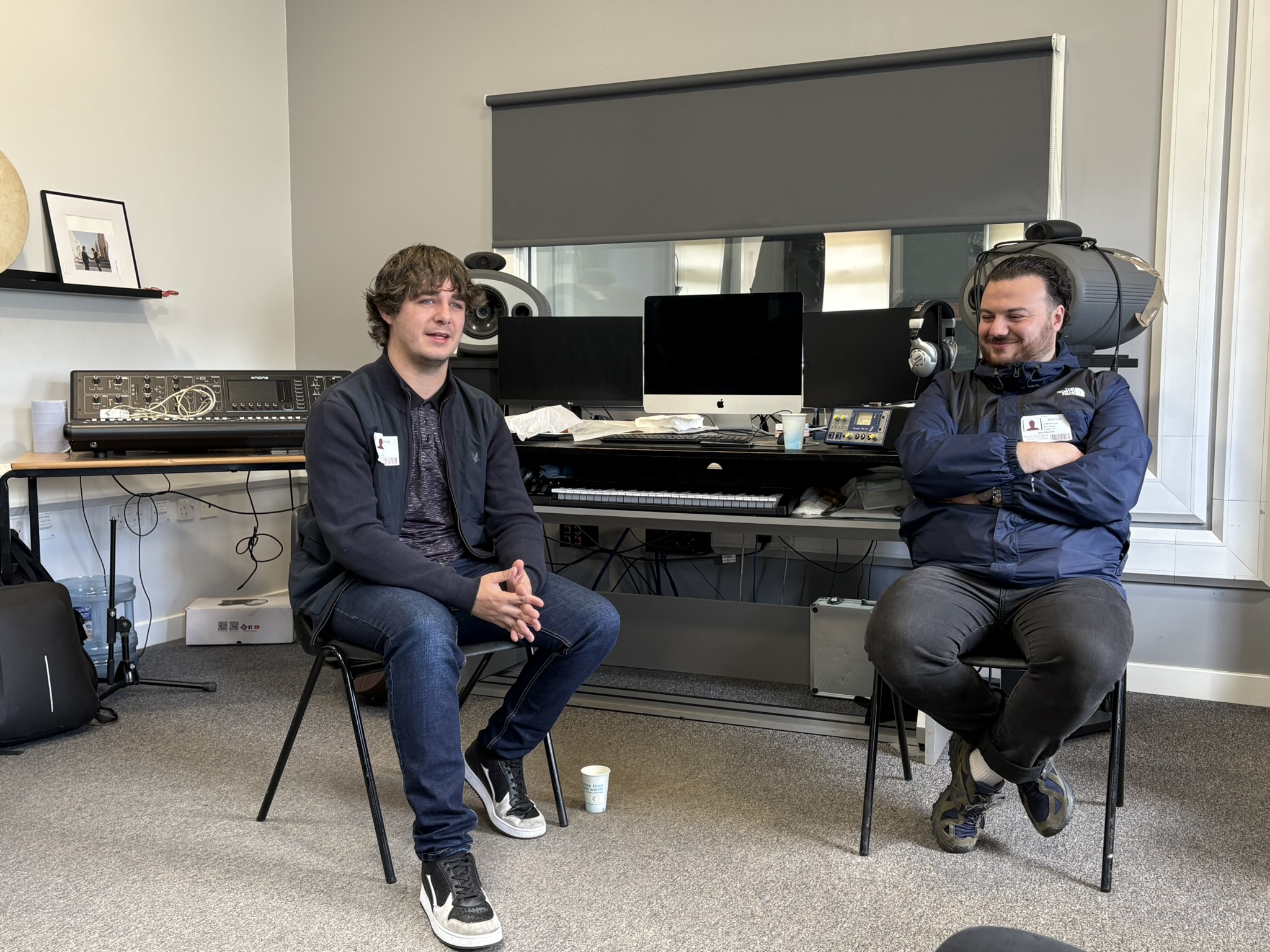 Brad Kella and Tour Manager Luigi in music studio.